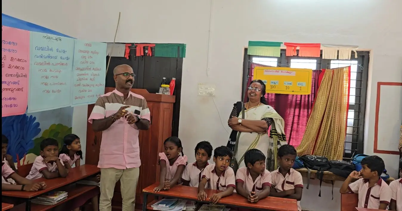 School visits, student interactions, and book donations in the Attapady region. - At GLPS Mulli