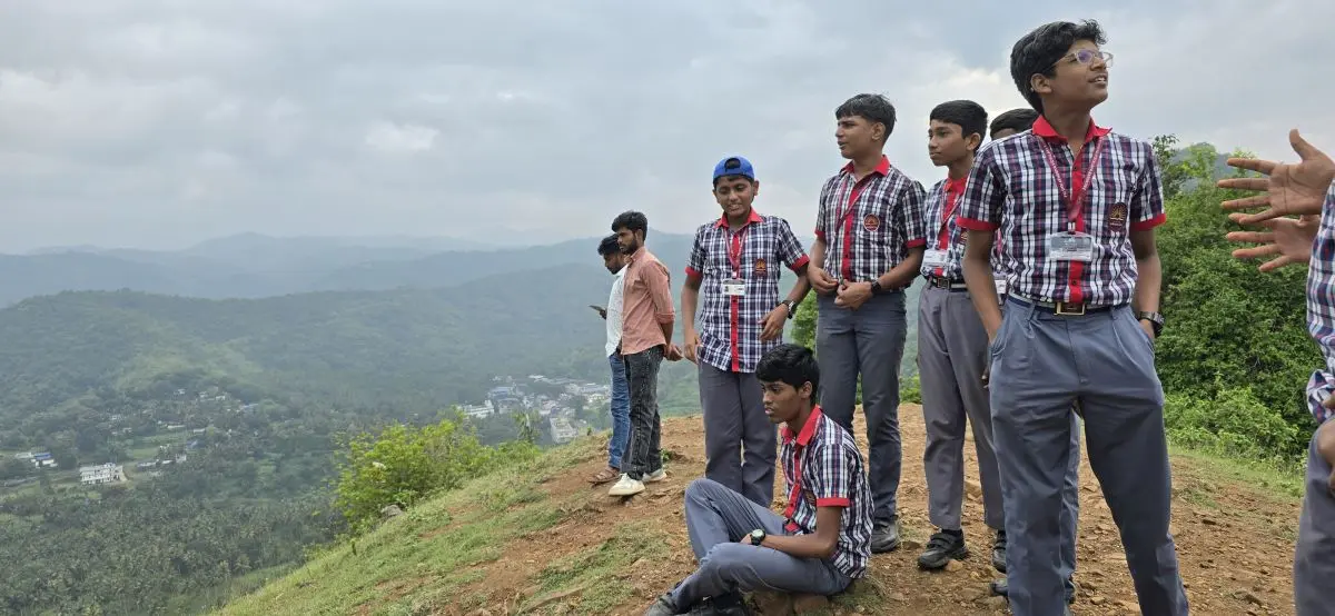 School visits, student interactions, and book donations in the Attapady region. - Narasimukku View Point