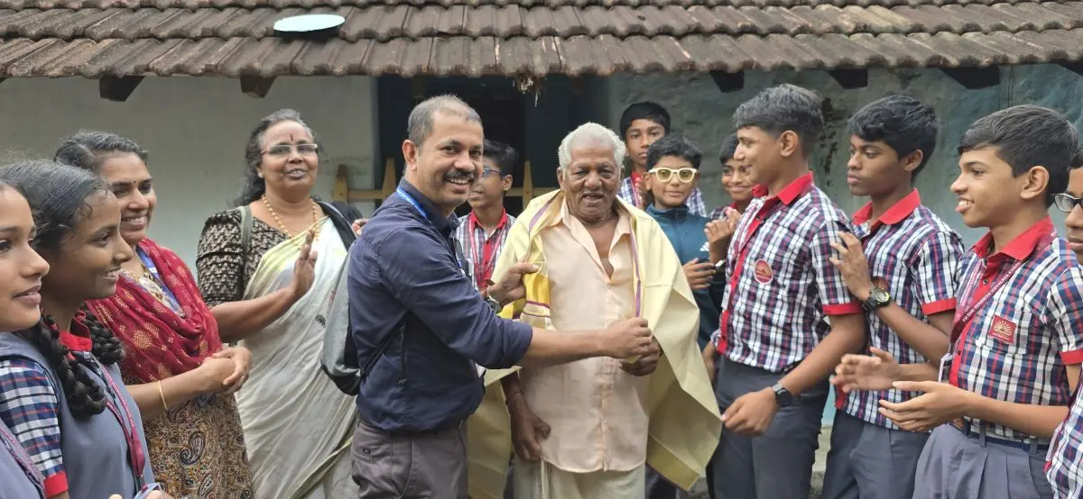 School visits, student interactions, and book donations in the Attapady region. - Felicitating Shri. Manappa Moopan