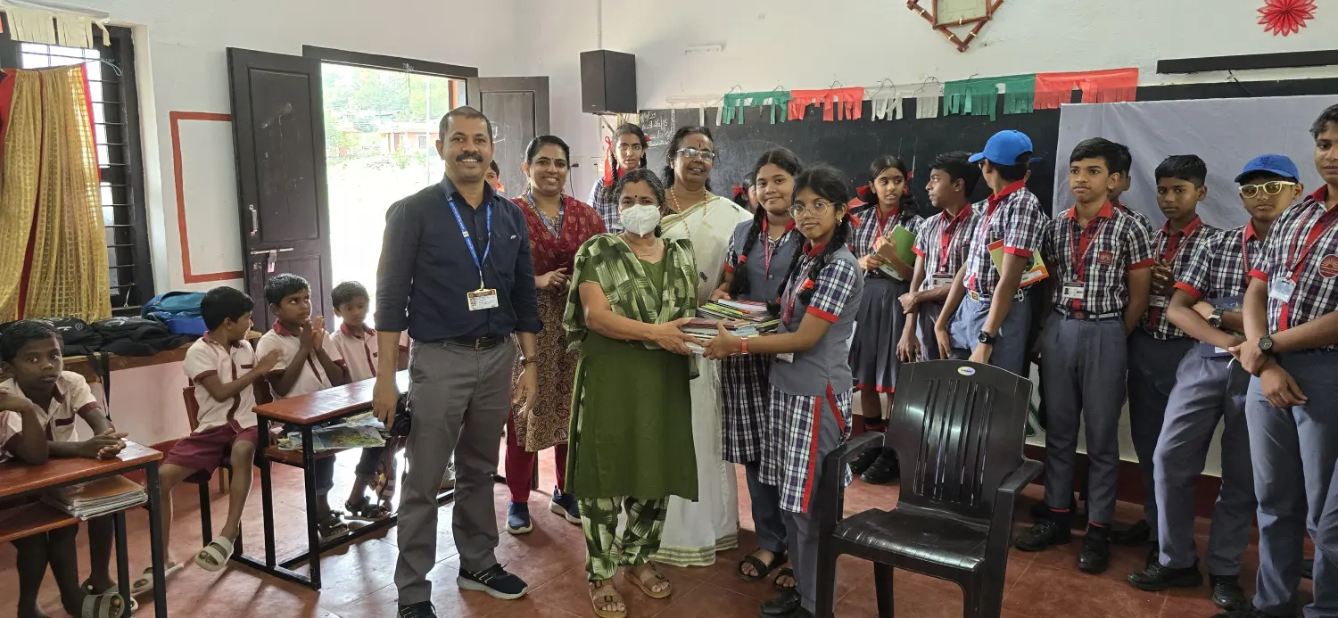 School visits, student interactions, and book donations in the Attapady region. - Book Donation to GLPS Mulli