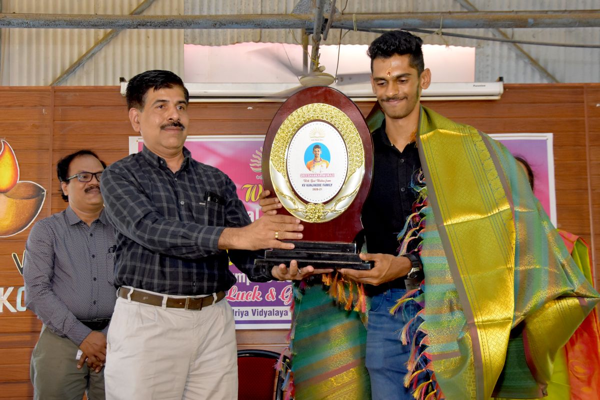  Mr. K Viswanathan, Principal I/c felicitating the Olympiad selectee
